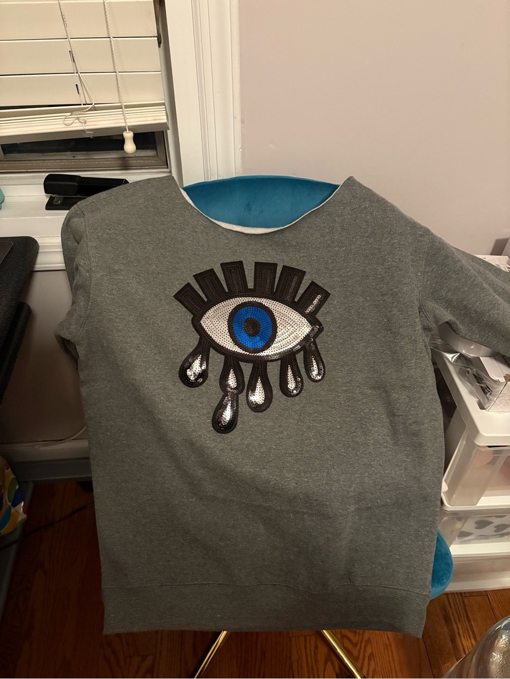 Off shoulder Grey Sweatshirt with Blue Eye Graphic
